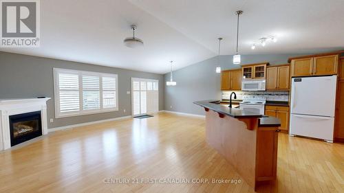50 - 620 Thistlewood Drive, London North (North C), ON - Indoor Photo Showing Kitchen With Fireplace