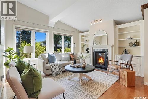91 Lindsay Drive, Saskatoon, SK - Indoor Photo Showing Living Room With Fireplace