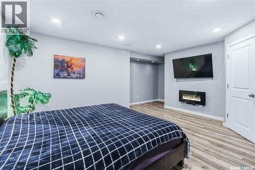 706 Stonebridge Common, Saskatoon, SK - Indoor Photo Showing Bedroom With Fireplace