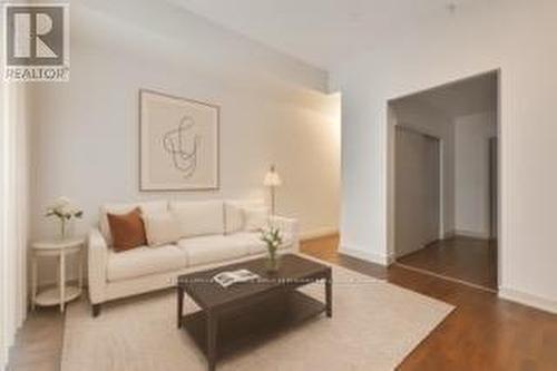 Virtually Staged - 705 - 126 Simcoe Street, Toronto, ON - Indoor Photo Showing Living Room