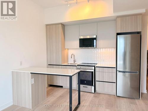 409 - 10 All Nations Drive, Brampton, ON - Indoor Photo Showing Kitchen