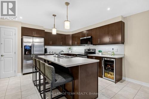317 Gallantry Way, Ottawa, ON - Indoor Photo Showing Kitchen With Stainless Steel Kitchen With Double Sink