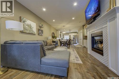 1129 7Th Street E, Saskatoon, SK - Indoor Photo Showing Living Room With Fireplace