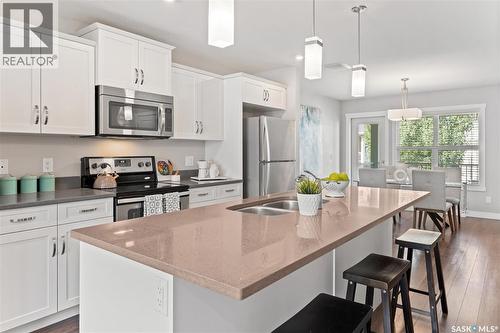 229 1220 Pringle Way, Saskatoon, SK - Indoor Photo Showing Kitchen With Double Sink With Upgraded Kitchen