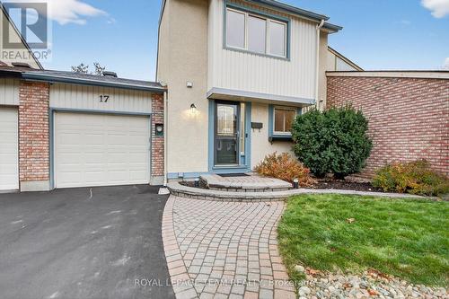 Landscaped front yard and newer driveway. - 17 Providence Place, Ottawa, ON - Outdoor