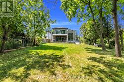 Rear elevation W/large porch and private backyard - 