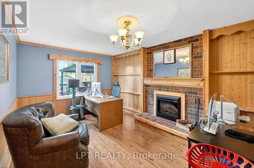 20 Burnley Place, Brampton, ON - Indoor Photo Showing Living Room With Fireplace
