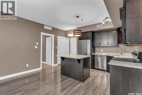 111 419 Nelson Road, Saskatoon, SK - Indoor Photo Showing Kitchen With Double Sink
