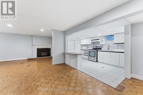 Breakfast Bar - 156 Trayborn Drive, Richmond Hill, ON - Indoor With Fireplace