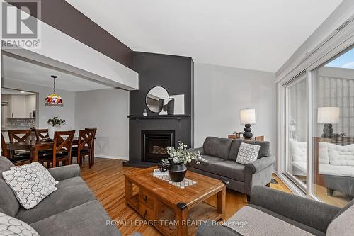 1095 Ambleside Drive, Ottawa, ON - Indoor Photo Showing Living Room With Fireplace