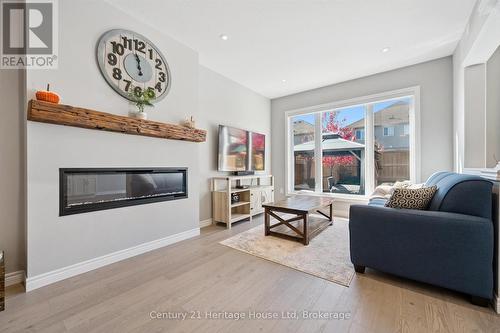 184 Macalister Boulevard, Guelph (Kortright East), ON - Indoor Photo Showing Living Room With Fireplace