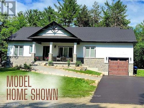 99 Tall Pines Drive, Tiny, ON - Outdoor With Facade