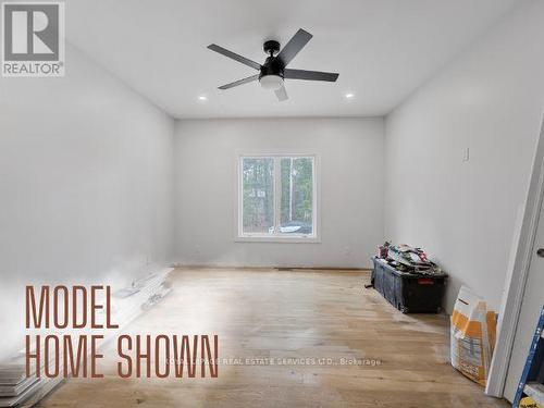 99 Tall Pines Drive, Tiny, ON - Indoor Photo Showing Other Room