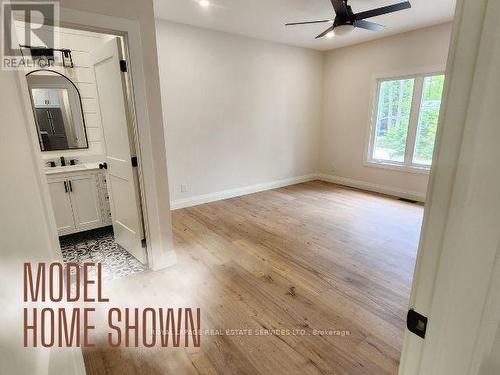 99 Tall Pines Drive, Tiny, ON - Indoor Photo Showing Other Room