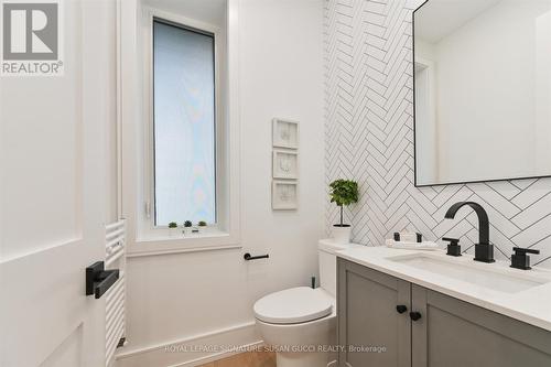 Main floor powder room tucked away for your guests - 32 Treadway Boulevard, Toronto, ON - Indoor Photo Showing Bathroom