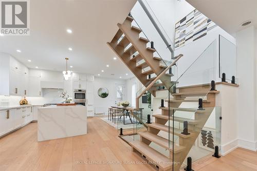 skylight and open risers allow light to pour in - 32 Treadway Boulevard, Toronto, ON - Indoor Photo Showing Kitchen With Upgraded Kitchen