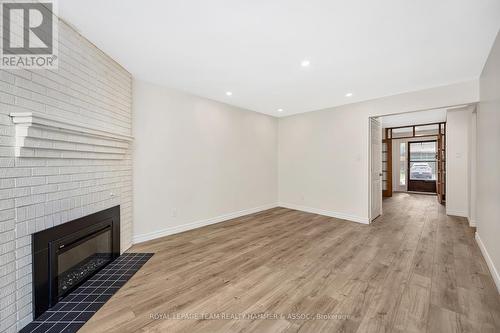 8 Chisholm Court, Ottawa, ON - Indoor With Fireplace