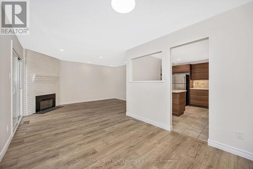 8 Chisholm Court, Ottawa, ON - Indoor Photo Showing Other Room With Fireplace