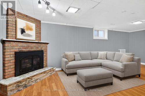 Virtually Staged Photo - 543 Howden Street, Peterborough (Otonabee Ward 1), ON - Indoor Photo Showing Living Room With Fireplace