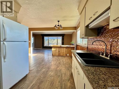 103 Cottonwood Crescent, Churchbridge, SK - Indoor Photo Showing Kitchen With Double Sink