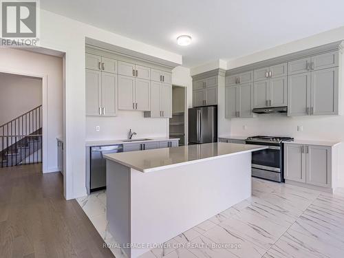 26 Hummingbird Grove, Adjala-Tosorontio, ON - Indoor Photo Showing Kitchen With Upgraded Kitchen