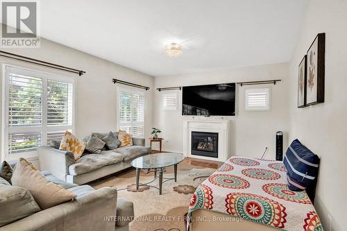 26 Peacock Crescent, Ajax, ON - Indoor Photo Showing Living Room With Fireplace