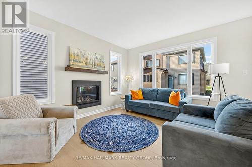 258 Sapling Grove, Ottawa, ON - Indoor Photo Showing Living Room With Fireplace