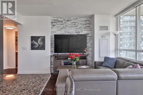 2504 - 2230 Lake Shore Boulevard W, Toronto, ON - Indoor Photo Showing Living Room With Fireplace