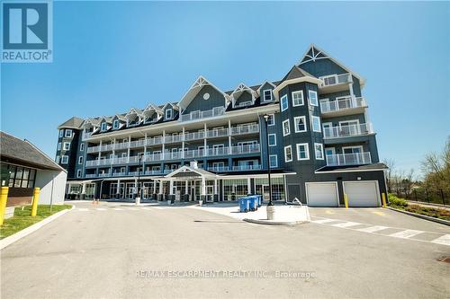 312 - 39 Sister Varga Terrace, Hamilton, ON - Outdoor With Balcony With Facade