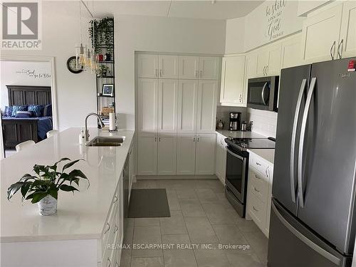 312 - 39 Sister Varga Terrace, Hamilton, ON - Indoor Photo Showing Kitchen With Double Sink