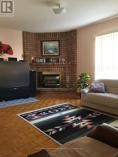 81 Dalmatian Crescent, Toronto, ON - Indoor Photo Showing Living Room With Fireplace