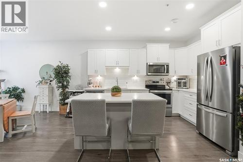 220 105 Willis Crescent, Saskatoon, SK - Indoor Photo Showing Kitchen With Stainless Steel Kitchen With Upgraded Kitchen