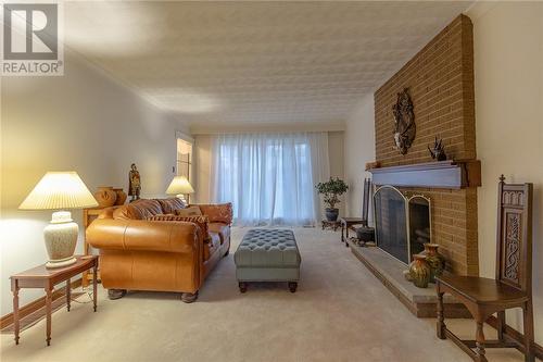 322 Sutherland Street, Espanola, ON - Indoor Photo Showing Living Room With Fireplace