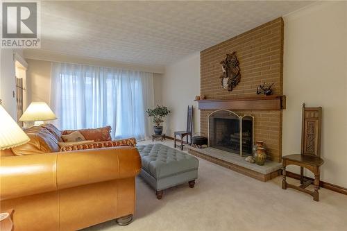 322 Sutherland Street, Espanola, ON - Indoor Photo Showing Living Room With Fireplace