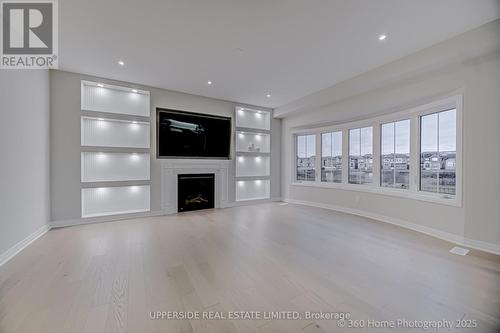 1727 Corsal Court, Innisfil, ON - Indoor Photo Showing Other Room With Fireplace