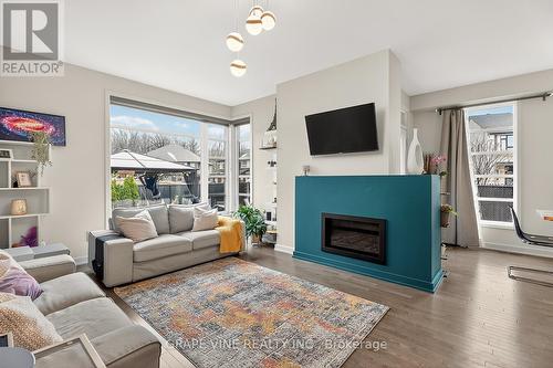 145 Larimar Circle, Ottawa, ON - Indoor Photo Showing Living Room With Fireplace