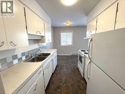 105 9807 104 Avenue, Fort St. John, BC - Indoor Photo Showing Kitchen With Double Sink
