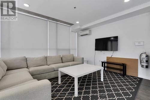 709 - 1900 Simcoe Street N, Oshawa, ON - Indoor Photo Showing Living Room