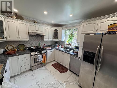 17 Graybark Crescent, Toronto, ON - Indoor Photo Showing Kitchen With Double Sink