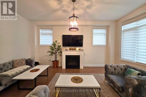 133 Marcel Brunnelle Drive, Whitby, ON - Indoor Photo Showing Living Room With Fireplace