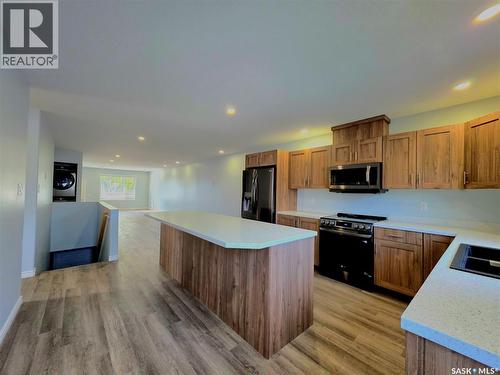 720 O Avenue S, Saskatoon, SK - Indoor Photo Showing Kitchen With Double Sink