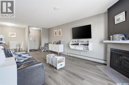 202 802B Kingsmere Boulevard, Saskatoon, SK - Indoor Photo Showing Living Room With Fireplace