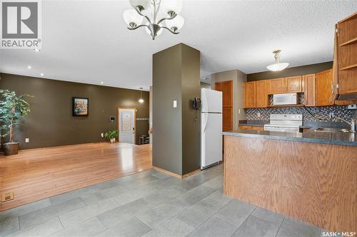 1122 Ferguson Crescent, Regina, SK - Indoor Photo Showing Kitchen With Double Sink