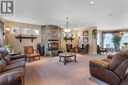 1480 Nighthawk Drive, Castlegar, BC - Indoor Photo Showing Living Room With Fireplace