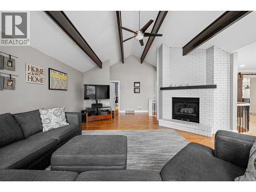 3885 Miller Road, Kelowna, BC - Indoor Photo Showing Living Room With Fireplace