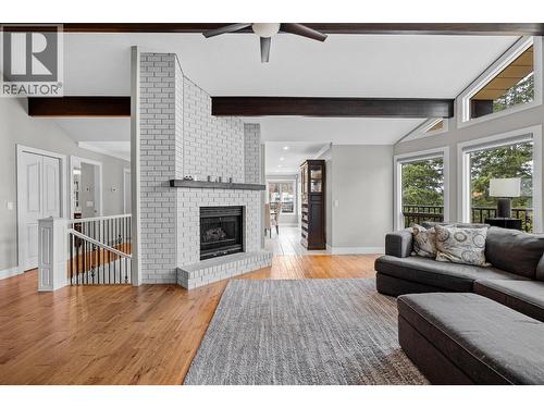 3885 Miller Road, Kelowna, BC - Indoor Photo Showing Living Room With Fireplace