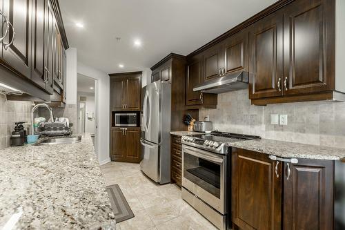 Kitchen - 1102-3855 Boul. De Chenonceau, Laval (Chomedey), QC - Indoor Photo Showing Kitchen With Upgraded Kitchen
