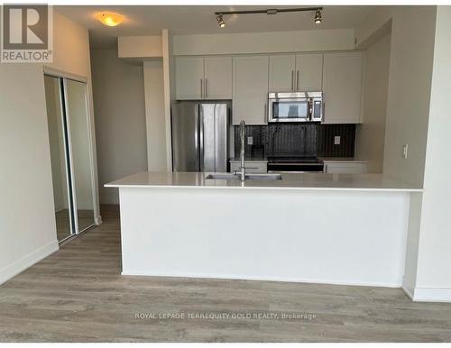 2405 - 4011 Brickstone Mews, Mississauga, ON - Indoor Photo Showing Kitchen With Stainless Steel Kitchen With Double Sink