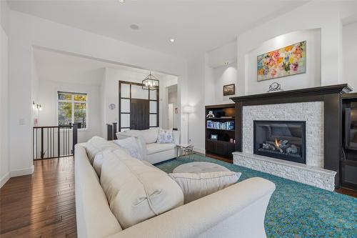 394 Prestwick Lane, Kelowna, BC - Indoor Photo Showing Living Room With Fireplace