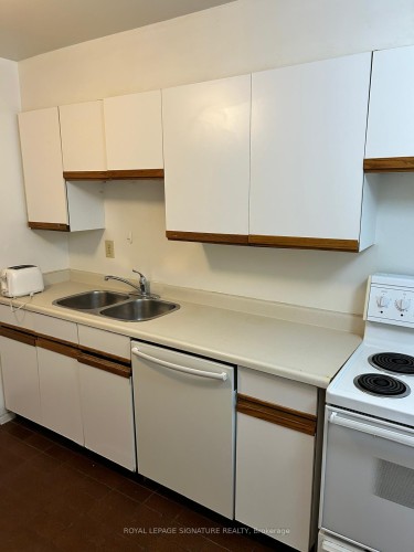 1711-45 Carlton Street, Toronto, ON - Indoor Photo Showing Kitchen With Double Sink